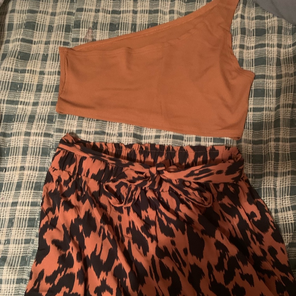 One shoulder crop top and cheetah shorts